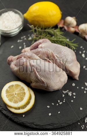 Raw Quail Meat On Kitchen, Cooking Gourmet Bird. Healthy Diet Recipe.