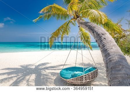 Tropical Beach Panorama As Summer Landscape With Beach Swing Or Hammock And White Sand And Calm Sea 