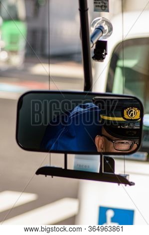 Hiroshima / Japan - December 20, 2017: Bus Driver Taking A Look In The Rear View Mirror, Hiroshima, 