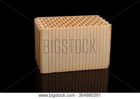 Ceramic Building Block Isolated On The Black Background
