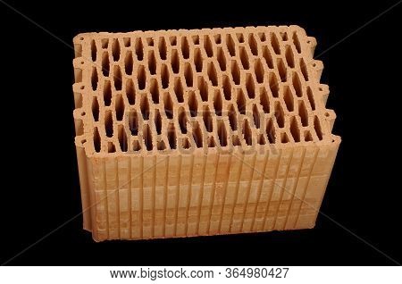 Ceramic Building Block Isolated On The Black Background