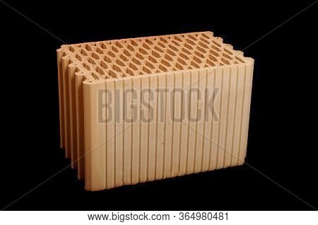 Ceramic Building Block Isolated On The Black Background