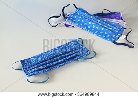 Sustainable Washable Masks For Multiple Use, Homemade Sewn From Blue Patterned Cotton As Protection 
