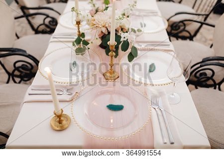 Wedding Dinner Table Reception. Close-up Of Wildcard With Gold Beads, Transparent Glass. Runner Of P
