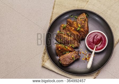 Roast And Braised Duck Breast With Sweet And Sour Berry Sauce