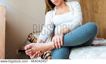 Pregnancy Foot Ankle Pain. Pregnant Woman Have Leg Disease, Ankle Pain Doing Health Massage Exercise