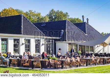 Schipborg, Netherlands - October 12, 2022: People Enjoying The Autumn Sun At A Restaurant In Schipbo
