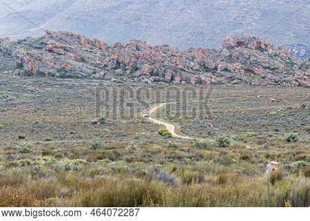 A Vehicle Is Visible On The Road From The Entrance Gate To The Stadsaal Caves In The Western Cape Ce