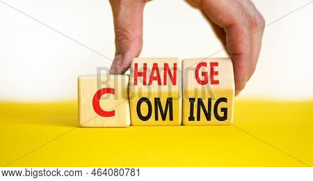 Change Is Coming Symbol. Concept Words Change And Coming On Wooden Cubes. Beautiful Yellow Table Whi