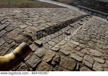Freeway Bridge Drainage. A Sound-absorbing Wall With Holes Lets Water Through. Gutters Collect Water