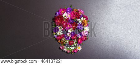 Paper Human Skull For Mexico's Day Of The Dead (el Dia De Muertos) With Traditional Flowers