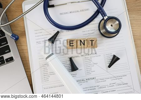 Top View Of Medical Documents, Equipments And Word Ent Collected With Wooden Cubes. Ear, Nose, Throa