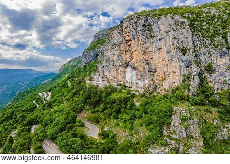 Monastery Of Ostrog, Serbian Orthodox Church Situated Against A Vertical Background, High Up In The 