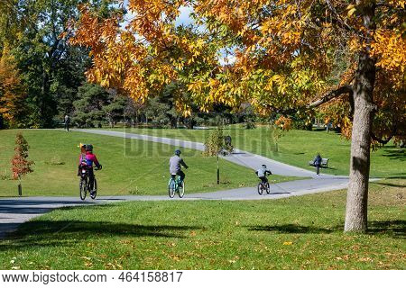 Montreal, Canada - 10 October 2022: People Riding Bikes In Maisonneuve Park In The Autumn Season
