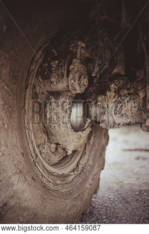 Off-road Truck Steering Knuckle Covered In Mud