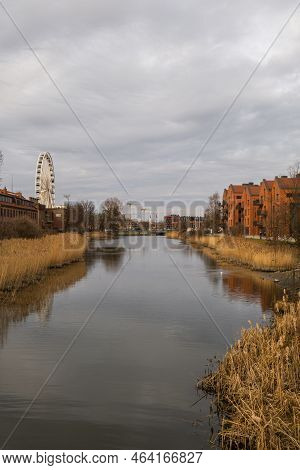 Old Town In Gdansk. The Riverside On Granary Island Reflection In Moltawa River Cityscap. Ancient Cr