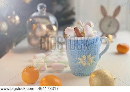 Blue Tea Cup With Marshmello Candies And Christmas Decorations. Winter Background -party Time At Coz