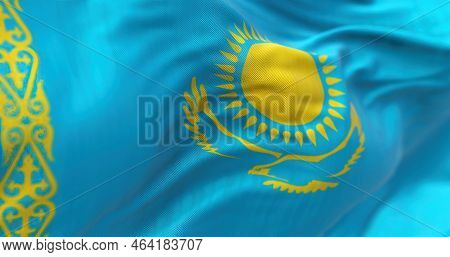 Close-up View Of The Kazakhstan National Flag Waving. The Republic Of Kazakhstan Is A Transcontinent