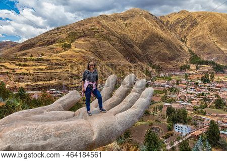A Woman At The Mirador De Cielo Punku Viewpoint In Huaro, Cusco, Peru. This Viewpoint Consists Of Tw