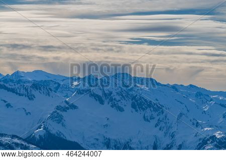View Of The Snow-capped Mountains In The Schmitten Ski Area In Zell Am See. In The Background Is A B