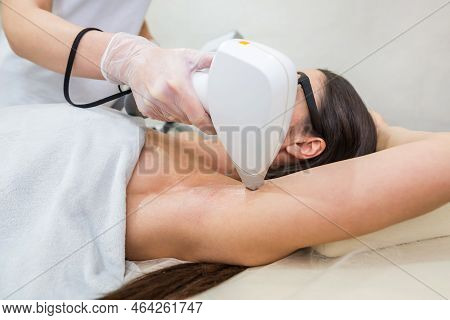 Laser Hair Removal And Cosmetology In A Beauty Salon. Hair Removal Procedure. The Concept Of Laser H