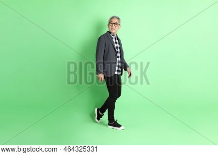 Asian Man On Green