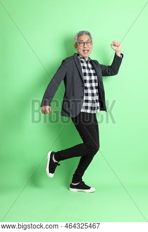 Asian Man On Green