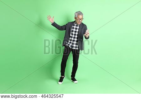 Asian Man On Green