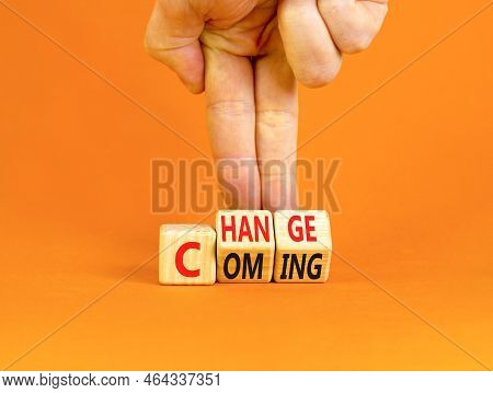 Change Is Coming Symbol. Concept Words Change And Coming On Wooden Cubes. Beautiful Orange Table Ora