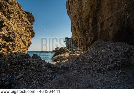 Beautiful View Of The Mediterranean Sea Through Rock Formations At Nerja Beach