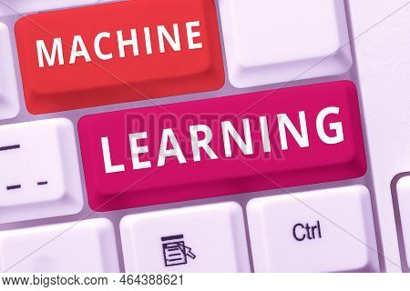 Hand Writing Sign Machine Learning. Word Written On The Concept That A Computer Can Learn New Data I
