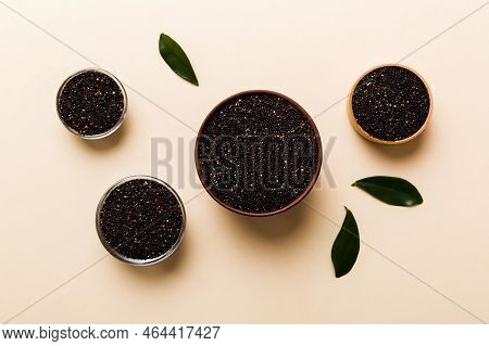 Quinoa Seeds In Bowl On Colored Background. Healthy Kinwa In Small Bowl. Healthy Superfood.