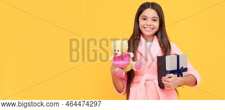 Good Morning. Kid Wear Soft Nightsuit Play With Toy. Child In Cozy Sleepwear. Teenager Girl With Bir