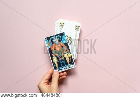London, Uk: 14 October, 2022: The 15 Major Arcana - The Devil Tarot Card Of Rider Waite Deck In Hand