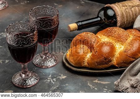 Shabbat Shalom Challah Bread, Shabbat Wine On A Dark Background, Place For Text, Top View,