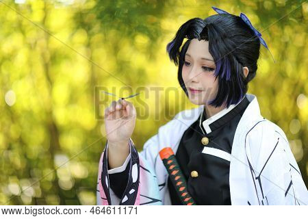 Japan Anime Cosplay Portrait Of Girl With Comic Costume With Japanese Theme