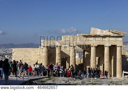 Athens, Greece - October 17, 2022: The Group Of Tourists In Front Of Propylaia, Monumental Ceremonia