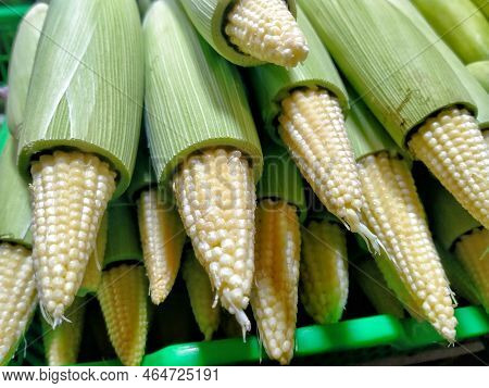 Baby Corn On Sale In A Market Stall.