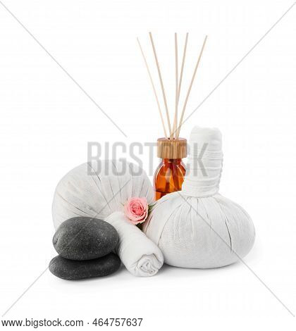 Herbal Massage Bags, Spa Stones And Air Reed Freshener On White Background