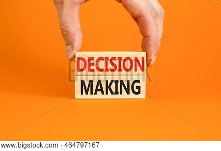 Decision Making Symbol. Concept Words Decision Making On Wooden Blocks. Beautiful Orange Table Orang