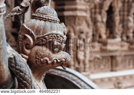 Close-up To The Beautiful Beside Head Of Garuda Wooden Statues , A Large Mythical King Of Bird.
