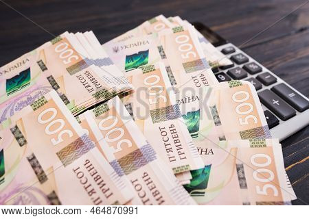 Close Up Of Hryvnia And Calculator. 500 Hryvnia. A Lot Of Ukrainian Money. Financial Concept