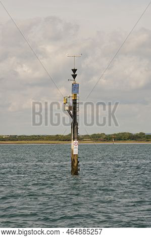 Weather Monitoring Station Mast In Middle Of Chichester Harbour Near Ichenor, West Sussex, England