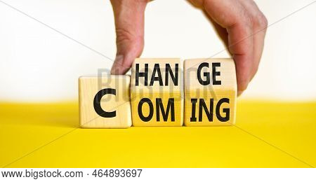 Change Is Coming Symbol. Concept Words Change And Coming On Wooden Cubes. Beautiful Yellow Table Whi