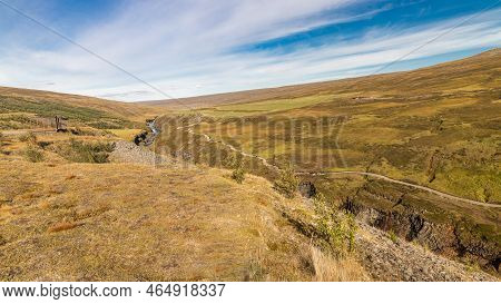 Overview Of Studlagil Ravine In Jokuldalur Iceland, Known For Its Columnar Basalt Rock Formations An