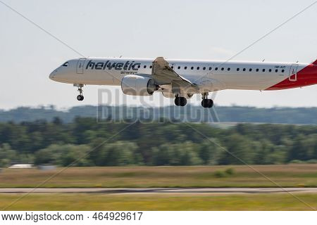 Zurich, Switzerland, May 20, 2022 Helvetic Airways Embraer E-195-e2 Aircraft Arrival On Runway 14