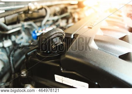 Motor Oil Cap Of The Automotive Engine On Plastic Cover In The Engine Compartment , Auto Maintenance