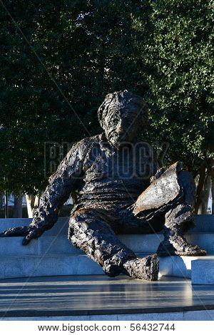 WASHINGTON, D.C., DECEMBER 28, 2013: Albert Einstein Memorial - bronze statue by Robert Berks on the grounds of the National Academy of Sciences. The Statue is a tourist magnet in National Mall.