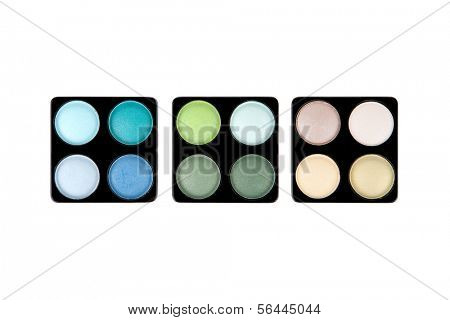 Three eyeshadow palettes isolated on white