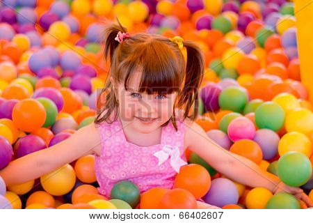 Little Girl In A Children's Play Room